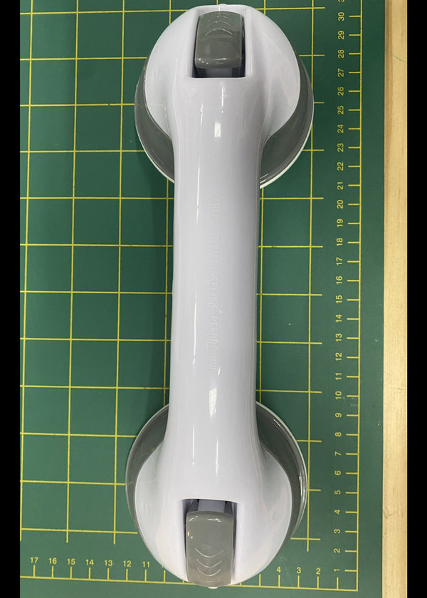Suction handle for templates when cutting fabric.