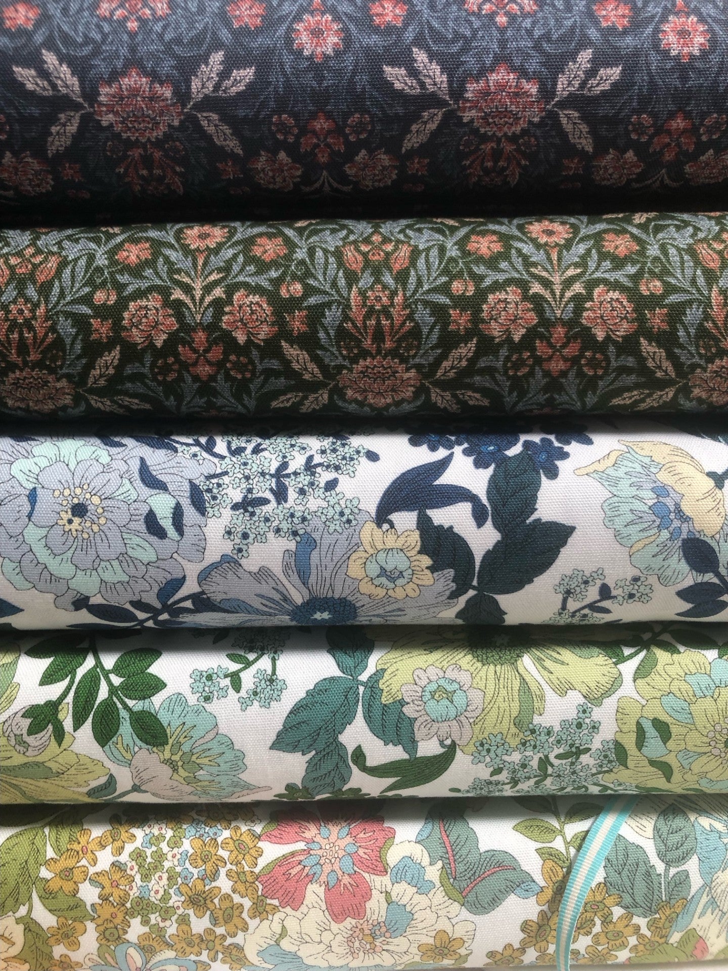 Cosmo textiles Japan floral fabric swatches in various colors and patterns.